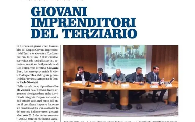 Il ritaglio di giornale sull’assemblea del Gruppo Giovani Imprenditori del Terziario, con il tavolo dei relatori